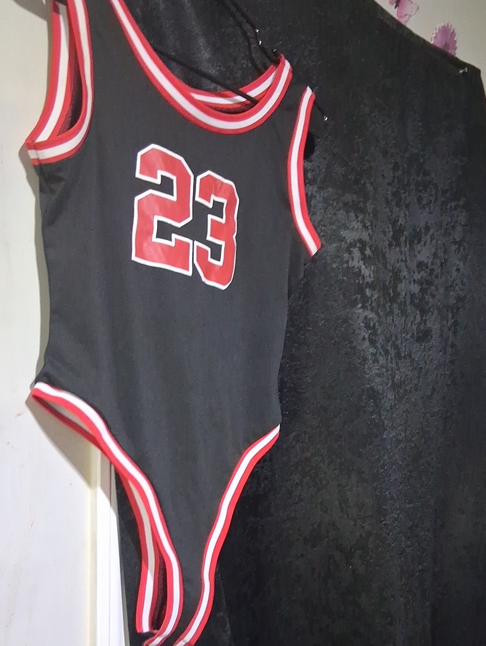 Kids Black Athletic Bodysuit with Red Trim and 23 Graphic